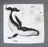 Loose black and white illustrated Humpback Whale with diving on a square napkin, hanging on a line with small wooden pegs